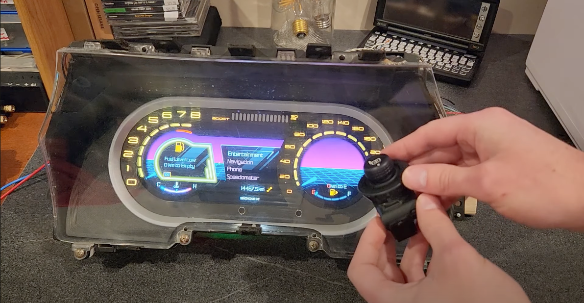 Elsner used this Ford mirror control as a joystick, or mouse, so a user can cycle through menus. <em><a href="https://www.youtube.com/@BlitzenDesignLab">Blitzen Design Lab</a>/YouTube</em>