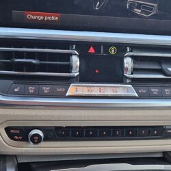 bmw control panel with radio and air quality buttons