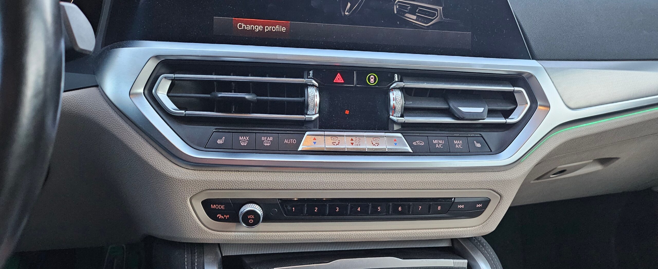 bmw control panel with radio and air quality buttons