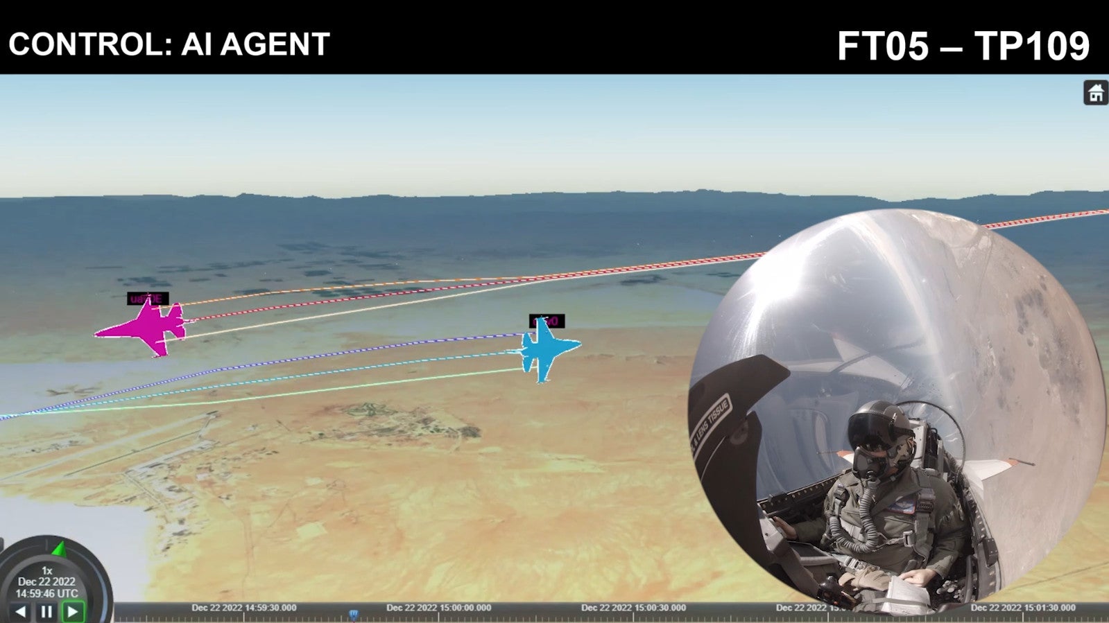 A screengrab from the newly released ACE video showing a visual representation of the X-62A and the F-16 merging during the mock dogfight, with a view from the VISTA jet's cockpit seen in the inset at lower right. <em>DARPA/USAF capture</em>