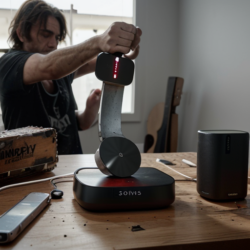 sonos music player being destroyed by an axe chopping it in half