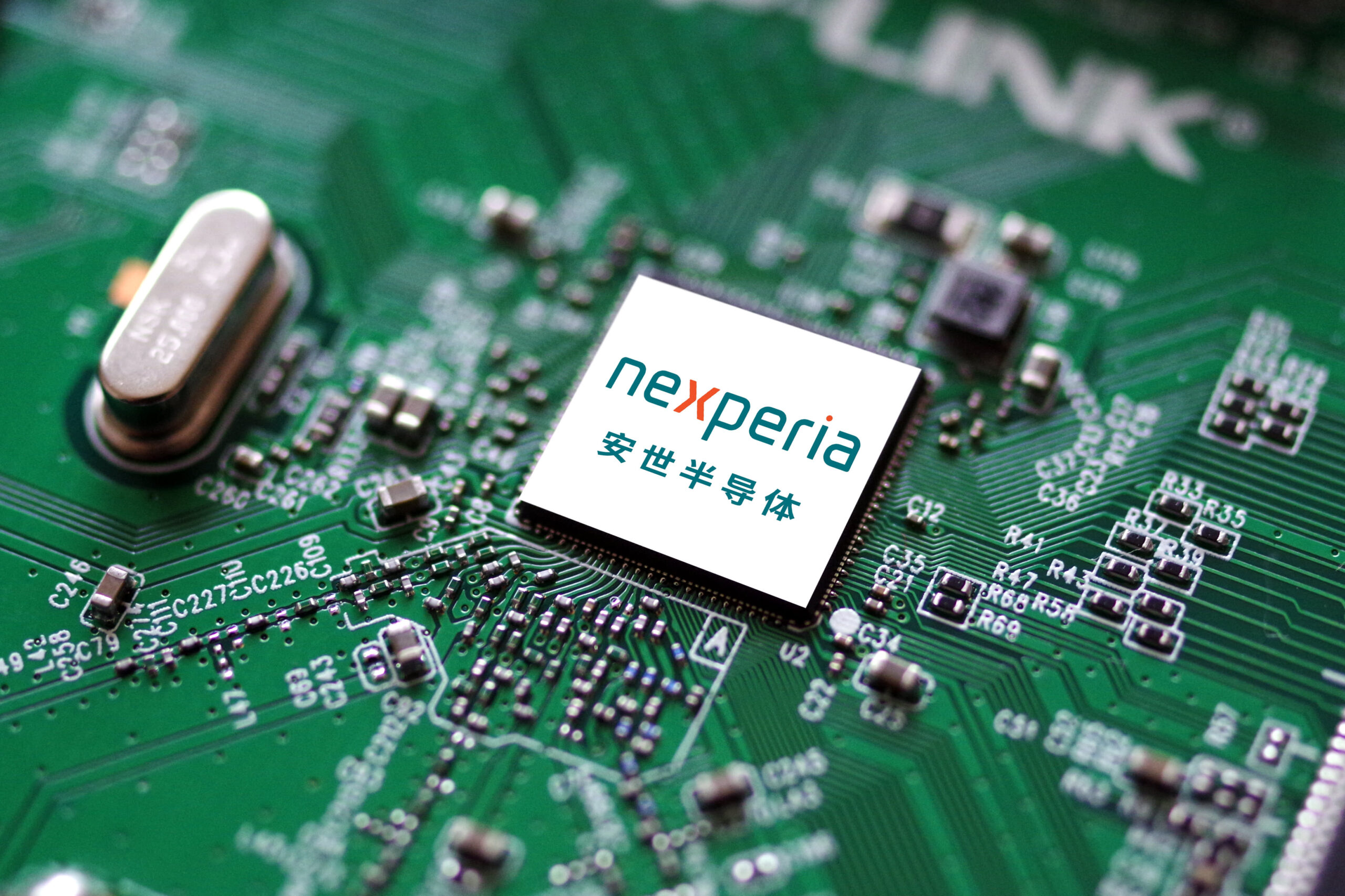 JINAN, CHINA - OCTOBER 23: In this photo illustration, the logo of semiconductor manufacturer Nexperia is displayed on a screen on October 23, 2025 in Jinan, Shandong Province of China. (Photo by VCG/VCG via Getty Images)